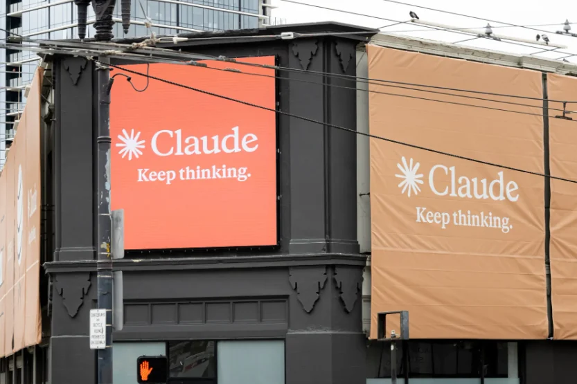 Anthropic Claude Keep thinking billboards on a city street